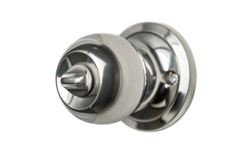 Handle on the door knob white backgroundの写真素材