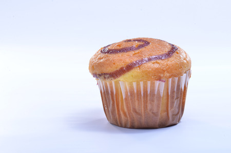 Cup cake with cheese on the white backgroundの写真素材