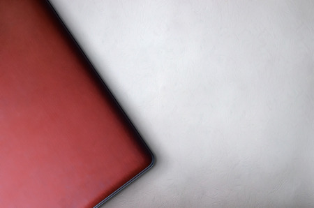 Top view of red laptop best background for presentation template in elegant grey backdropの写真素材