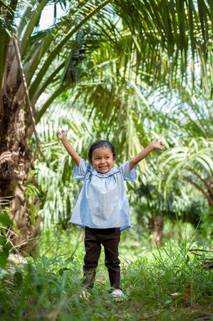 Happy cute Asian girl enjoy playing outdoor in summer. Playing Outside