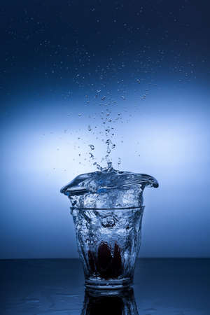 Water Splash in glass against on white background, isolated objectの写真素材