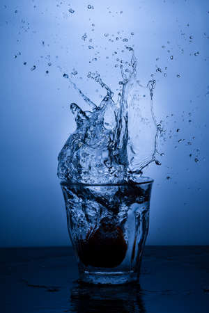Water Splash in glass against on white background, isolated objectの写真素材