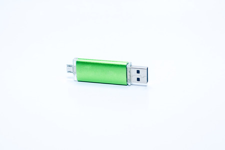 The green USB driveの写真素材