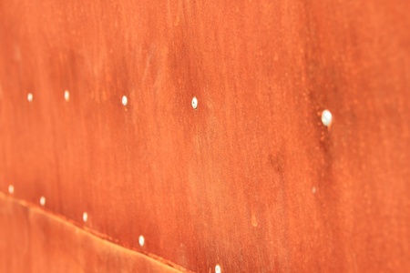 The surface of the metal studs in the background の写真素材