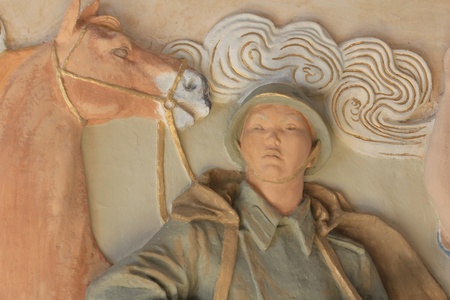 The bas-relief on the wall. A soldier with a horse. close-upのeditorial素材