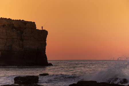 Fisherman on cliff / Algarve - Portugal