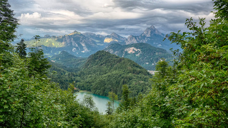View at the Alatsee lake and the Bavarian Alpsの写真素材