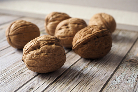 Walnuts on weathered wood