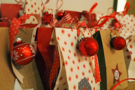 Crafted advent calendar with baubles and ribbonsの写真素材