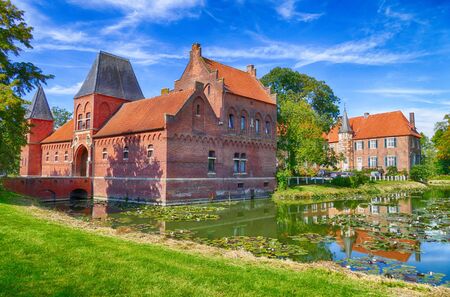 Historical rural moated castle in Westphaliaの写真素材