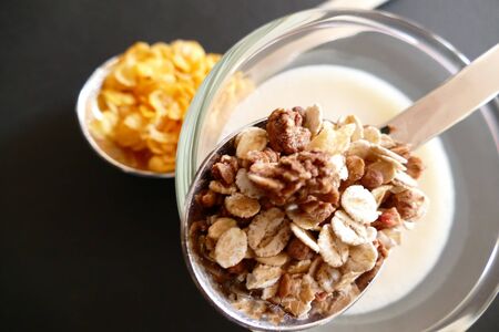 Muesli, cornflakes and milkの写真素材