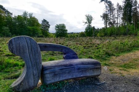 Bench at a vantage point in the Ohligser Heide heathlandの写真素材