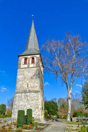 Church tower on a cemetery in Gruiten Dorfの写真素材