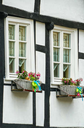 Windows with flower boxes on a half-timbered house in Hattingen Blankensteinの写真素材