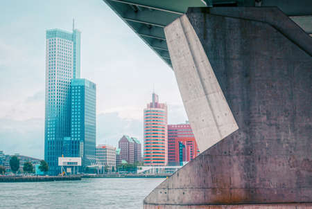 Bridge and modern architecture by the river Maas in Rotterdamの写真素材
