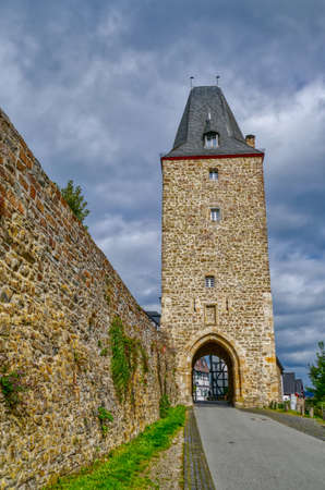 Historical tower and city wall in old Blankenbergの写真素材