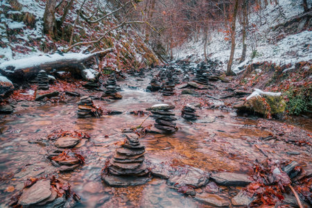 Stone piles in the creek in the Helletal valley in Winterberg
