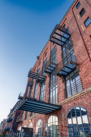 Old brick buildings and balconies in the city harbor of Munsterのeditorial素材
