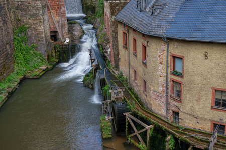 Historical mill and waterfall in the old center of Saarburg by the river Saarのeditorial素材