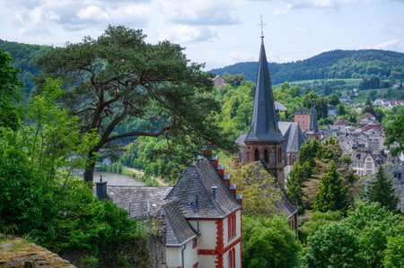 View from the Saarburg castle ruins at the historical church and the old centreのeditorial素材