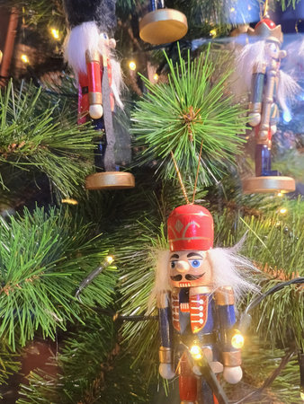 Illuminated Christmas tree and nutcrackers at a Christmas market