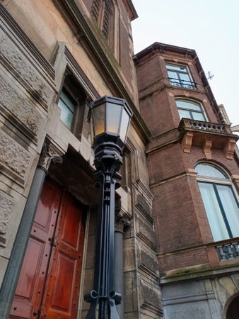 Lantern and historical facade in Amsterdamの写真素材