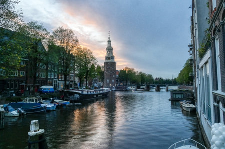 Town canal and historical buildings in Amsterdamの写真素材