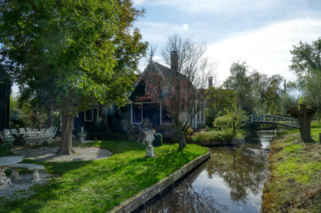 Historical green wooden house in Zaandam in the Netherlandsの写真素材