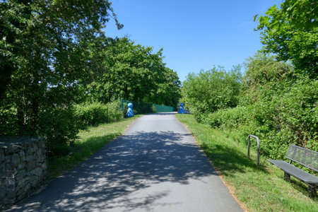 Bike trail on a former rail line between Oberhausen Sterkrade and Duisburg Walsumの写真素材