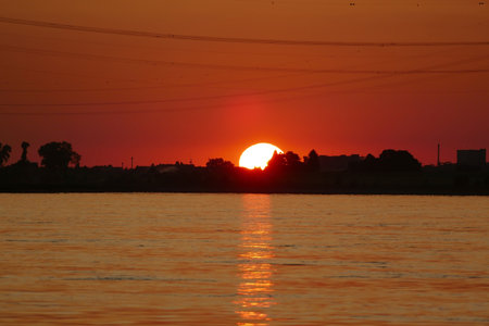 Sunset over the Rhine in Wittlaer near Dusseldorfの写真素材