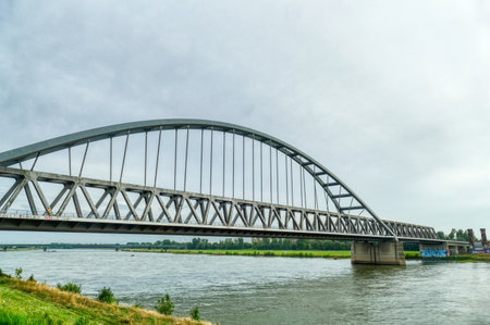 Railway bridge across the river Rhine in Dusseldorf Hammの写真素材