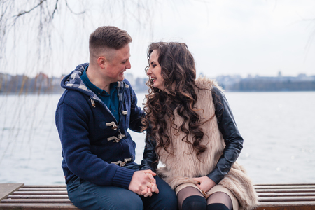 couple in love walking around the city and the riverの写真素材