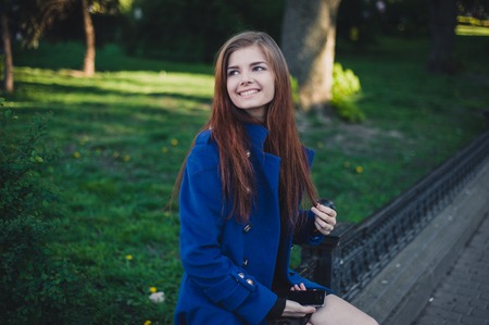 beautiful lady walks in sun cityの写真素材