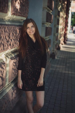 beautiful lady walks in sun city hdの写真素材