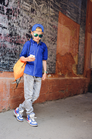 mother with son on a walk around townの写真素材