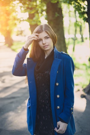 beautiful lady walks in sun cityの写真素材