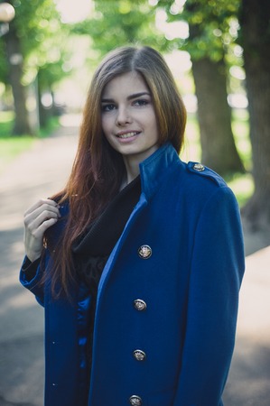 beautiful lady walks in sun cityの写真素材