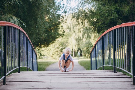 girl walking in the park near the riverの写真素材