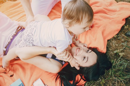 family picnic at a good time. uses the means of communication. sitting in cafeの写真素材