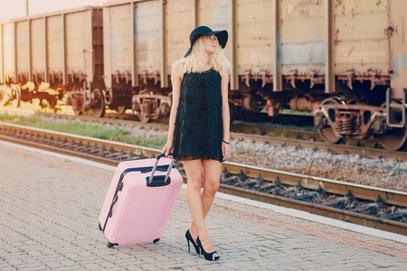 beautiful girl at raiway station. uses communicationの写真素材