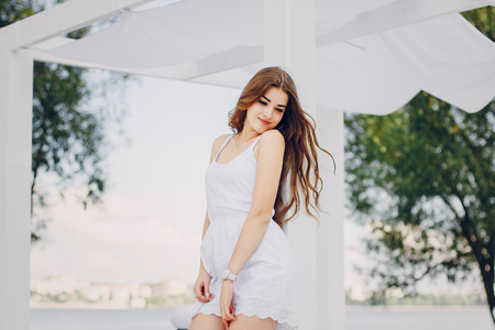 two girls resting on the beachの写真素材