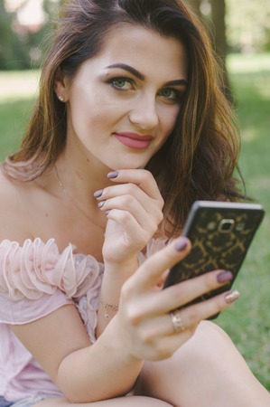 girl doing makeupの写真素材