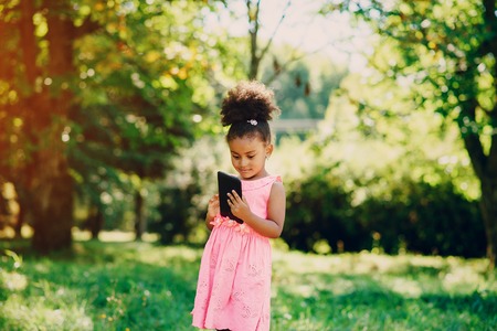 little girl on a walkの写真素材