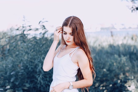 two girls resting on the beachの写真素材