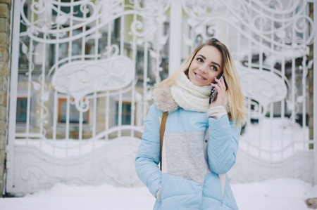 beautiful girl on winter walkの写真素材