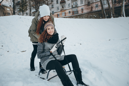 girl with sledgeの写真素材