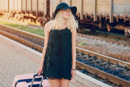 beautiful girl at raiway stationの写真素材