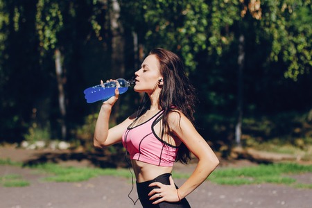 sports girl in parkの写真素材