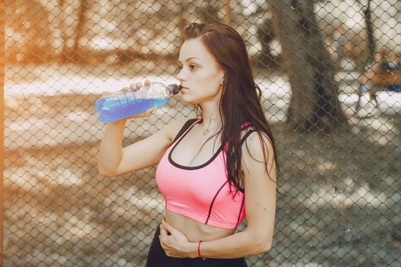 sports girl in parkの写真素材