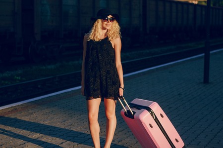 beautiful girl at raiway stationの写真素材